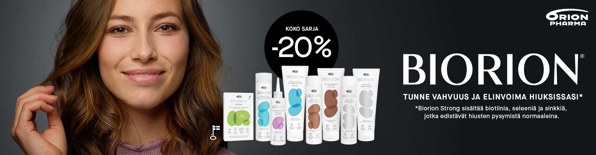 Pitkähiuksinen nainen tummalla taustalla Biorion hiustenhoitotuotteiden kanssa. Biorion tuotteet -20% huhtikuun  ajan