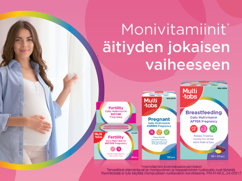 Raskaana oleva nainen pitelee vitamiinipurkkia vatsansa p&auml;&auml;ll&auml;